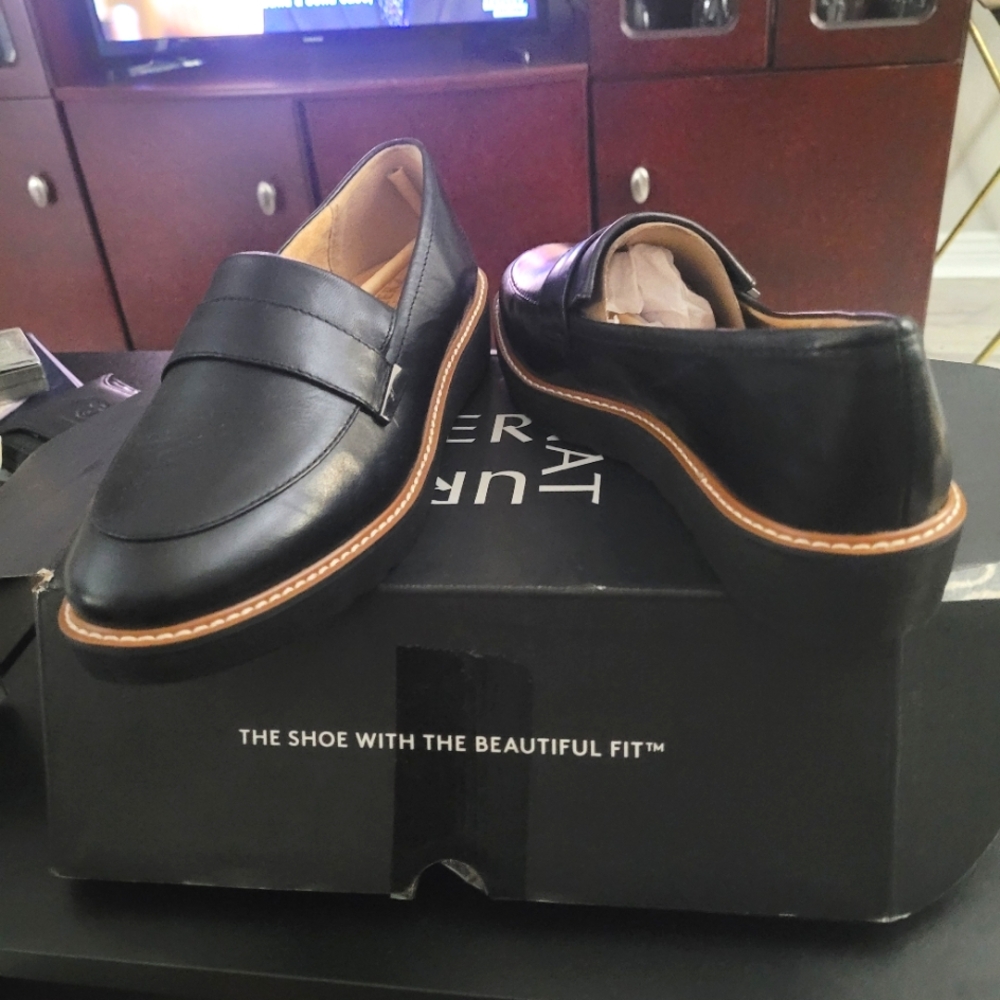 Ladies Sophisticated Black and Tan Leather Loafers